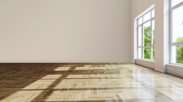 Scène d'intérieur sur plancher en bois massif avec casque de chantier jaune et outils de menuiserie disposés sur parquet naturel